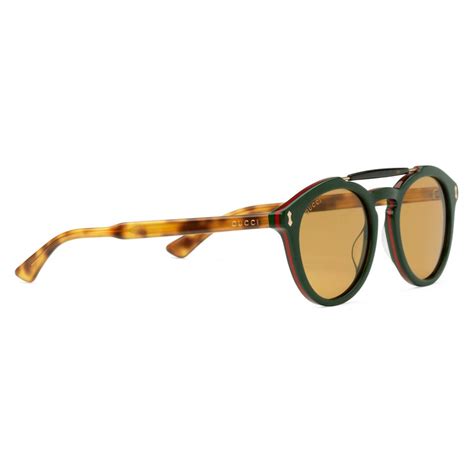 occhiali gucci tartaruga custodia verde|Occhiali da sole rotondi in tartarugato e acetato verde .